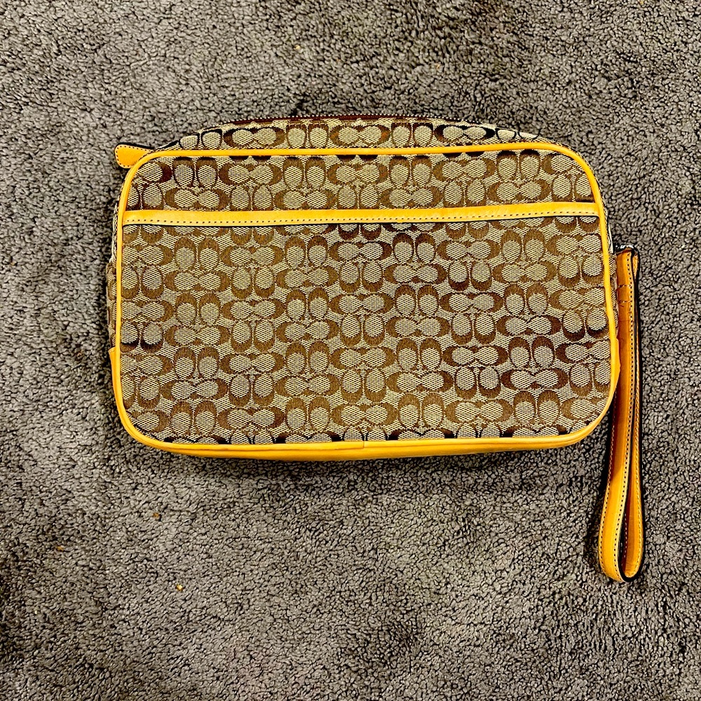 Large Tan Coach Clutch with wristlets strap